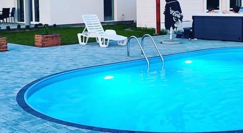 Apartamenty Wilga - spokojne miejsce z ciszą nocną od 22, całorocznym zewnętrznym wspólnym jacuzzi, sauną i sezonowym basenem - Image 1