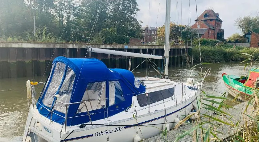 Cosy Sailing Boat Glamping Accommodation on the River in Sandwich - Image 1