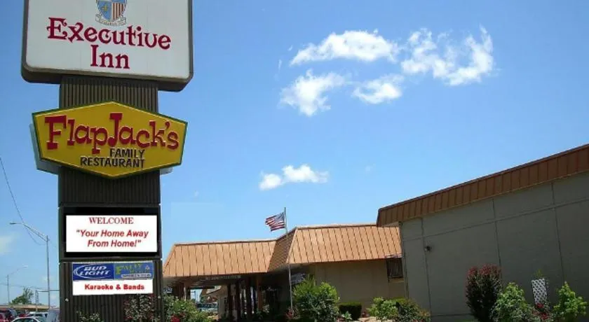 Executive Inn and Suites Springdale - Image 1