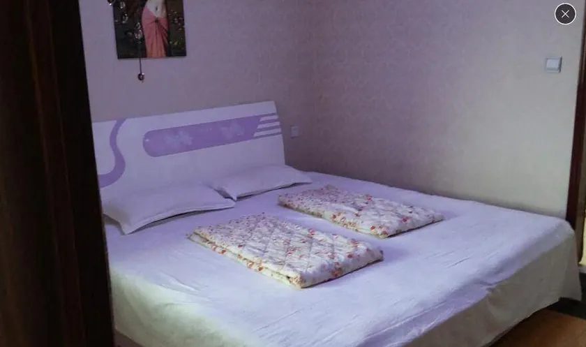 Xinlong Hotel - Image 1