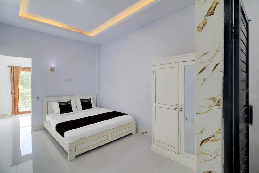 Hotel O near Mangusada Hospital formerly Rare Home Cozy Stay Premier 2 - Image 1