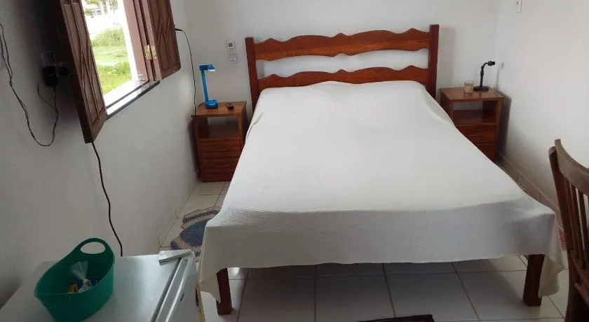 Casa Rosa da Ilha - Suíte com Ar-condicionado e Jardim Amplo - Image 1