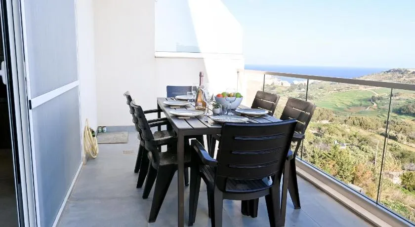 A Sunny Bay View + shared pool Gozo - Happy Rentals - Image 1