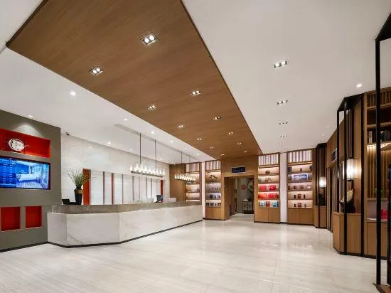Century Star Boutique Hotel (Zhoukou Railway Station Red Star Macalline Branch) - Image 1