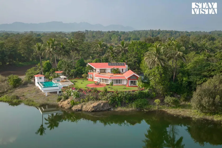 StayVista's Waterway Retreat - Lakeside Oasis with Infinity Pool - Image 1