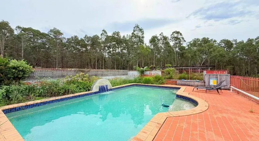 1BR Near Bus Stop with Pool & Farm Views - Image 1