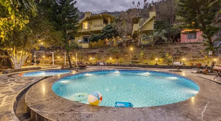 ELIVAAS Signature Zephyr Sierra - 2 BHK Hillside Retreat With Common Pool, Gym & Restaurant - Image 1