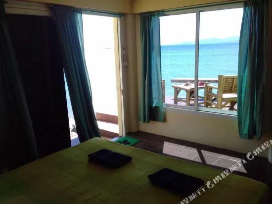 Zenzi Beach Room Resort - Image 1