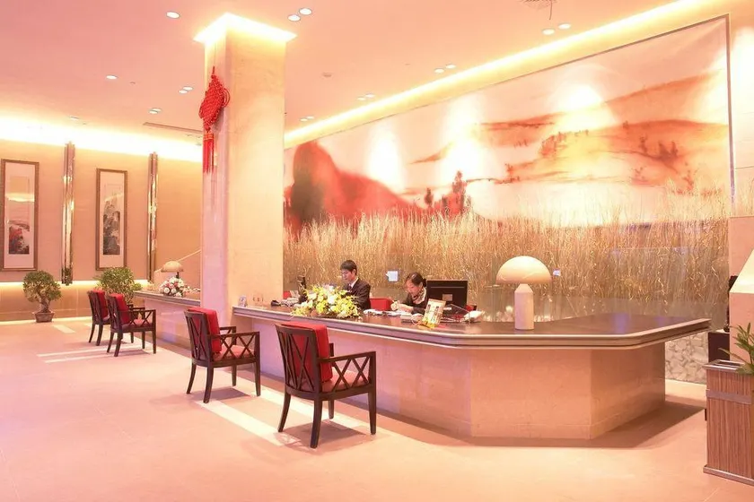 Sujia Jinlong Business Hotel - Image 1