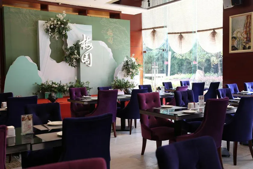 Plum Garden International Hotel - Image 1