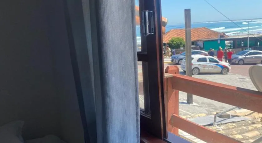 Suites e Quartos Em frente a Praia Grande -Na orla Flavia Alessandra - Image 1