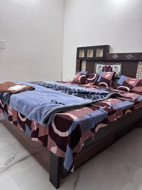 Skyline Abode - 2BHK Family Stay - Image 1