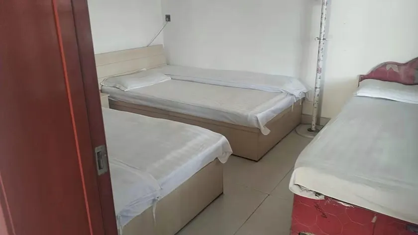 Quanxiang Supermarket Hotel - Image 1