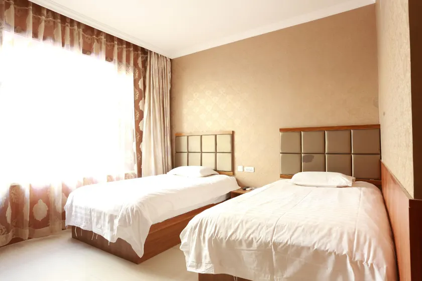 Qian Guoxin Dingsheng Hotel - Image 1