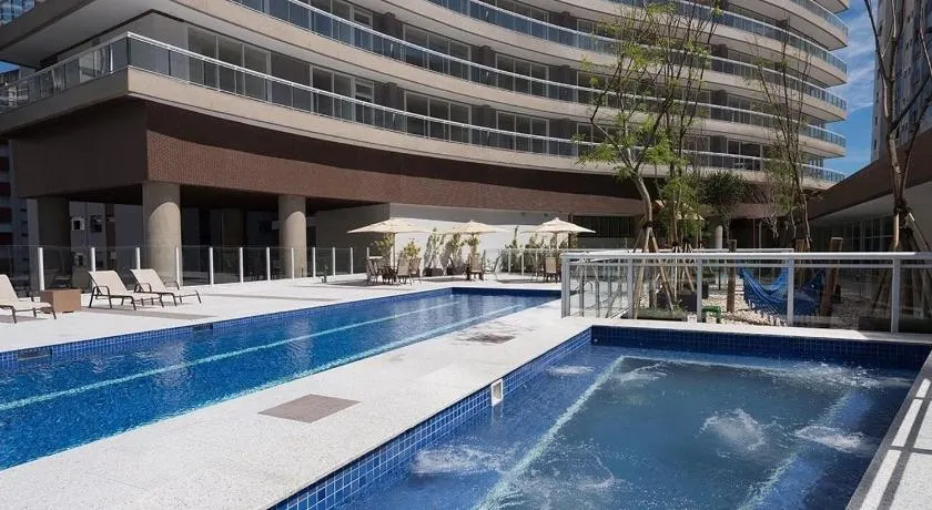 Studio moderno em condomínio de luxo pé na areia - Image 1