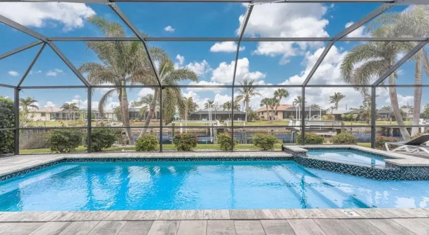 Villa Tranquility-Waterfront-Free Amenities-Heated Pool-Bikes-Dock Fishing & Beach Gear - Image 1