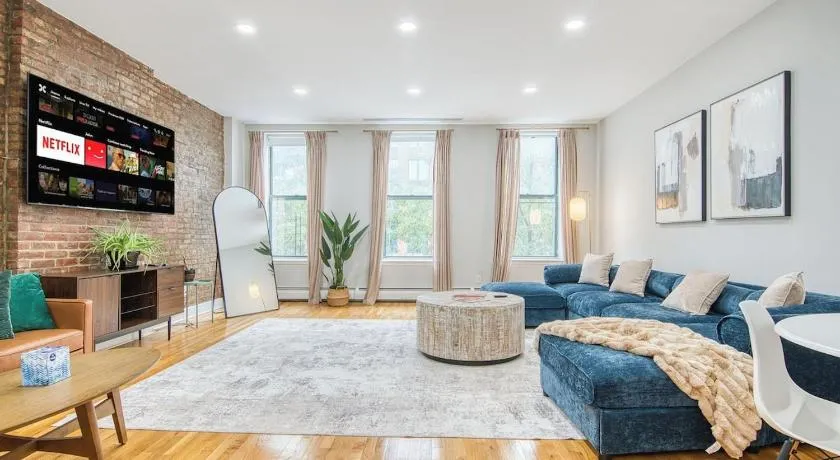 Haven on Bruckner Sprawling 2BR w King Bed fast WiFi 20 minutes to Times Square - Image 1