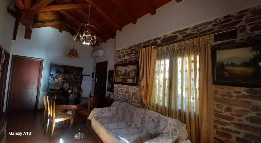 Traditional Stone House with Modern Renovation - Image 1