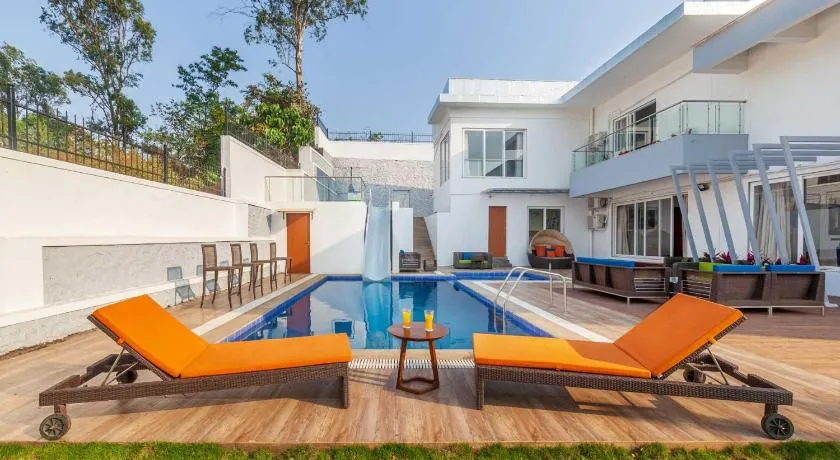 StayVista's White Pebbles - A Villa with Theater Room & Swimming Pool - Image 1