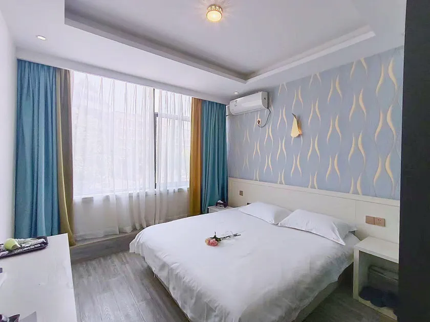 Xinduo Hotel (Pengzhou Wangshuli Branch) - Image 1