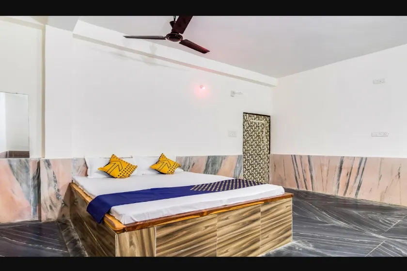 SPOT ON 82835 Mangalam Lodge Hingnaa Rd - Image 1