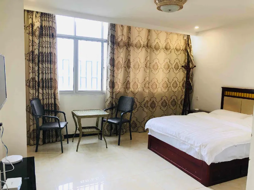 Wenbo Hotel - Image 1