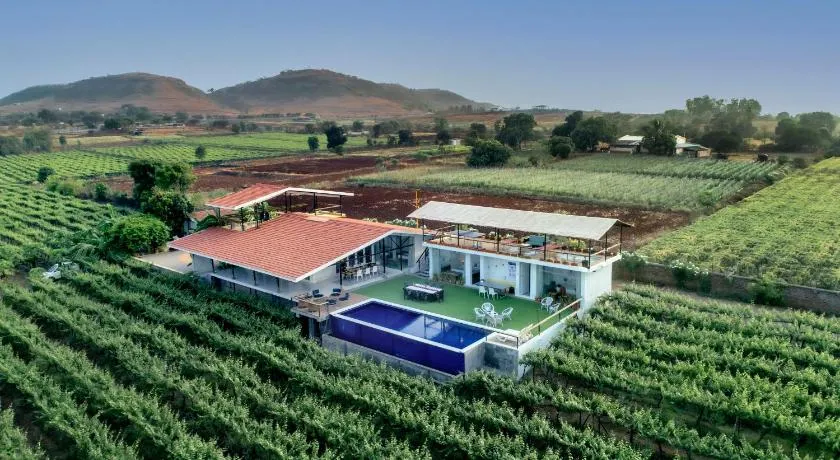 SaffronStays Onellaa, Nashik - infinity pool villa surrounded by a vineyard - Image 1