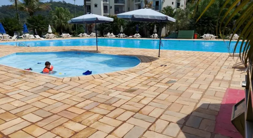 Apartamento Condomínio Wembley Tênis - Toninhas - Ubatuba - SP - Image 1