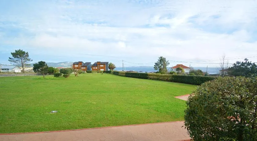 Apartamento con jardín en Playa de Corrubedo - Image 1