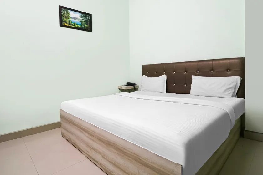 Hotel O Night Inn - Image 1