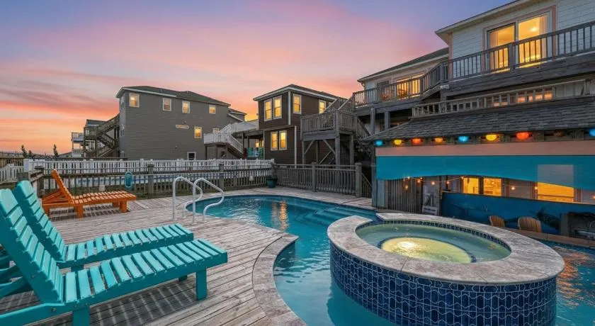 Joshua's Tiki Hut - Nags Head MP 11, Oceanfront, Elevator, Pool, Swim-Up Tiki Bar, Hot Tub, Pets OK - Image 1
