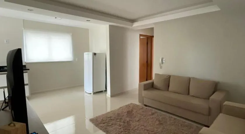 Apartamento em Poços - Varanda com Churrasqueira - Image 1