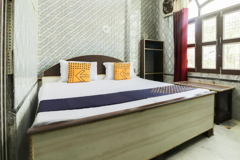 SPOT ON 63207 Om Sai Guest House And Hotel - Image 1