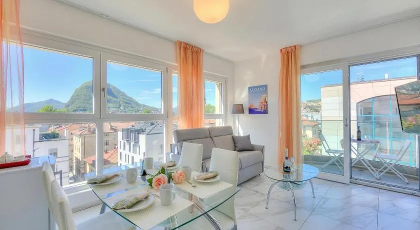 Attico al Parco: Penthouse in Lugano | Balcony, A/C & 2 min from Lake - Happy Rentals - Image 1
