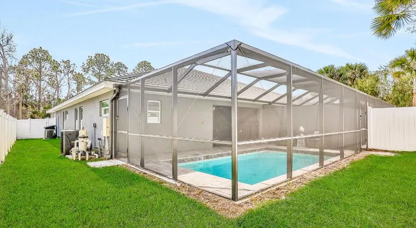 Brand-new duplex with screened pool, furnished lanai, AC, & washer/dryer - Image 1