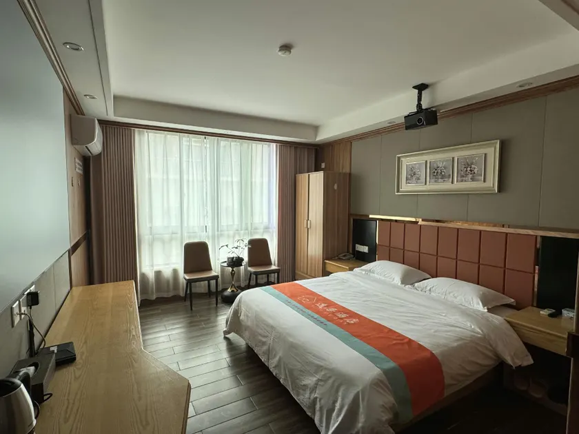 Yiju Luxury Cinema Apartment (Binhai Industrial Zone Branch) - Image 1