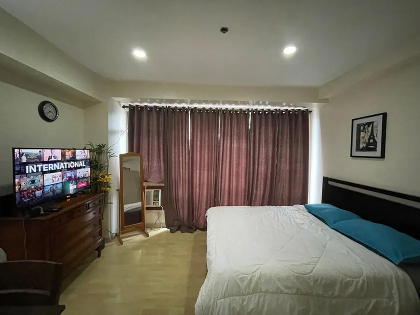SOHO Central EDSA Shaw Condo Pool front with SMART TV - Image 1