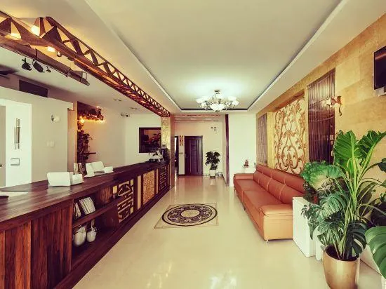 Linjiang Guanglong Business Hotel - Image 1