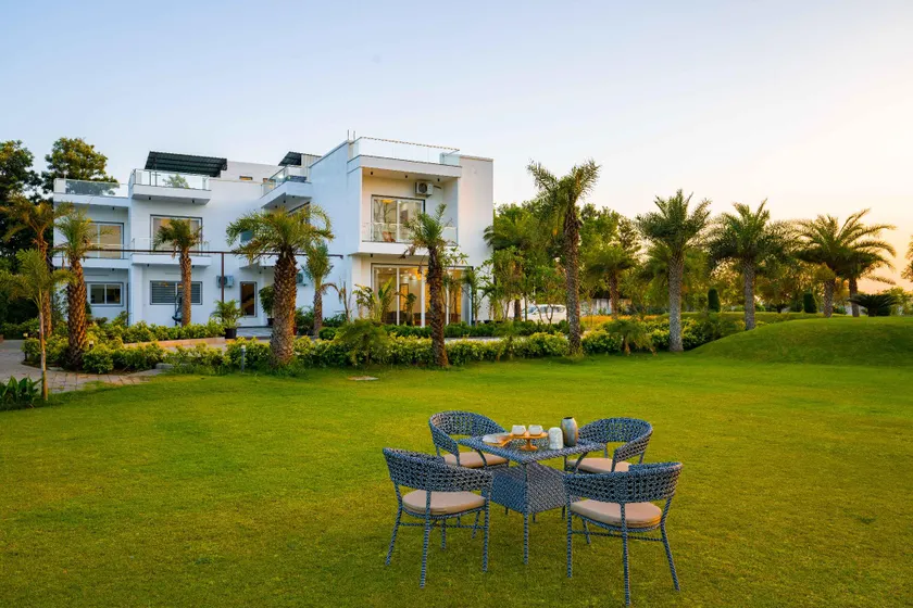 ELIVAAS AdhiVa 5-BHK Farmhouse with Private Pool, Bar & Lush Garden - Image 1