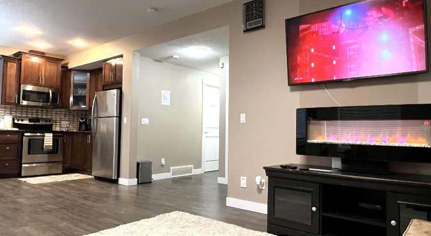 Spacious Private Cozy Walkout Entire Suite Close to Airport, Downtown, Shops, Stampede & Rocky Mountains with many Amenities in Panorama Hills NW - 4 Can Sleep - Image 1