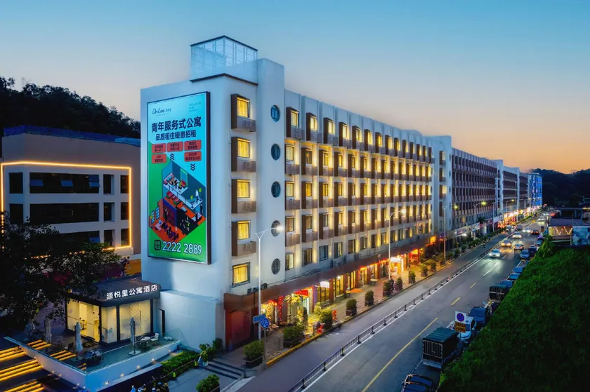 Dongguan Guomao Yuanyueli Youth Hotel - Image 1