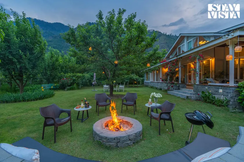 StayVista at Mayflower Aramgarh in middle of Orchards with Lawn, Bonfire, BBQ - Image 1