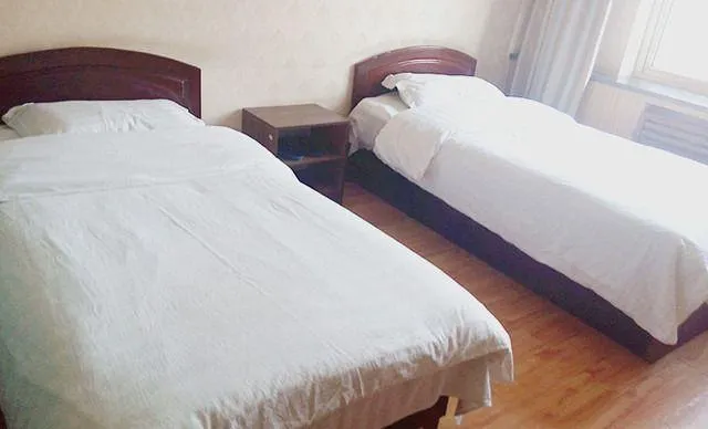 Shenglong Hotel - Image 1