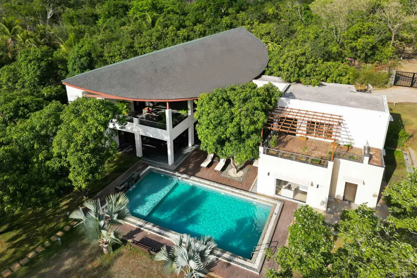 The Leaf by StayVista - An enchanting escape offering a pool, terrace, lush lawn, contemporary interiors, and indoor games - Image 1