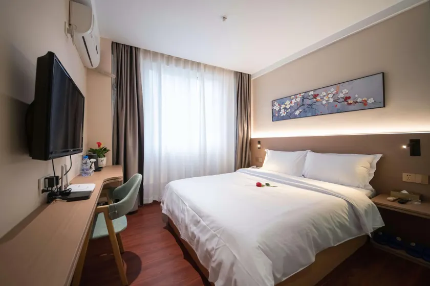 Kana Business Hotel (Zhanjiang Haitian Park Yingzhan Holiday Plaza) - Image 1
