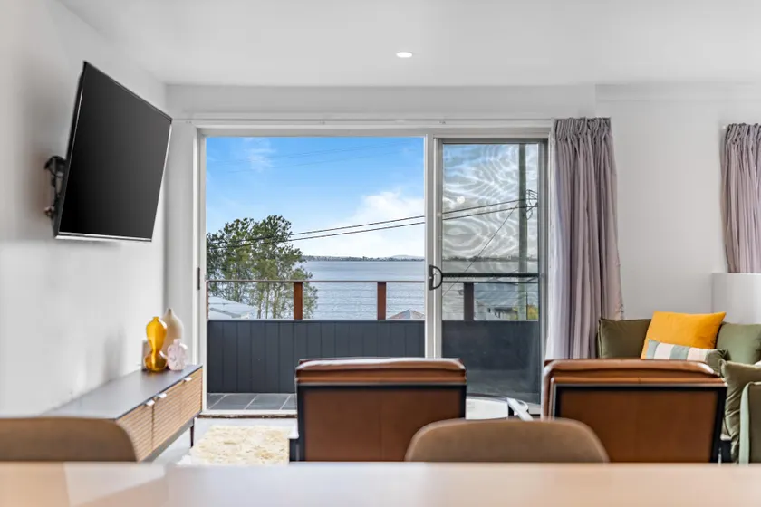 Lakeside 2-Bed Retreat with Sunny Balcony - Image 1