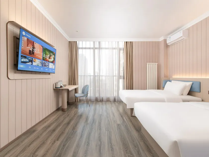 Hanting Hotel Dalian Development Zone Dongcheng World - Image 1