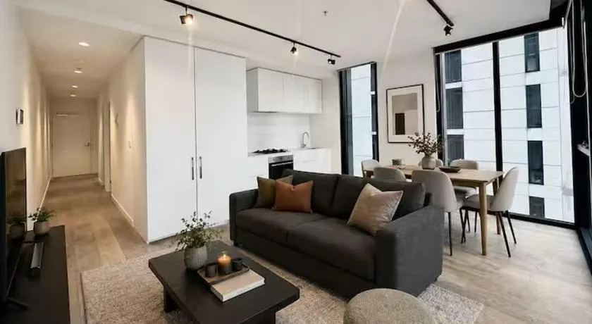 Modern CBD-Edge 2BR Apartment with City Views, Pool, Gym & Sauna in West Melbourne, Near Queen Victoria Market & Marvel Stadium - Image 1