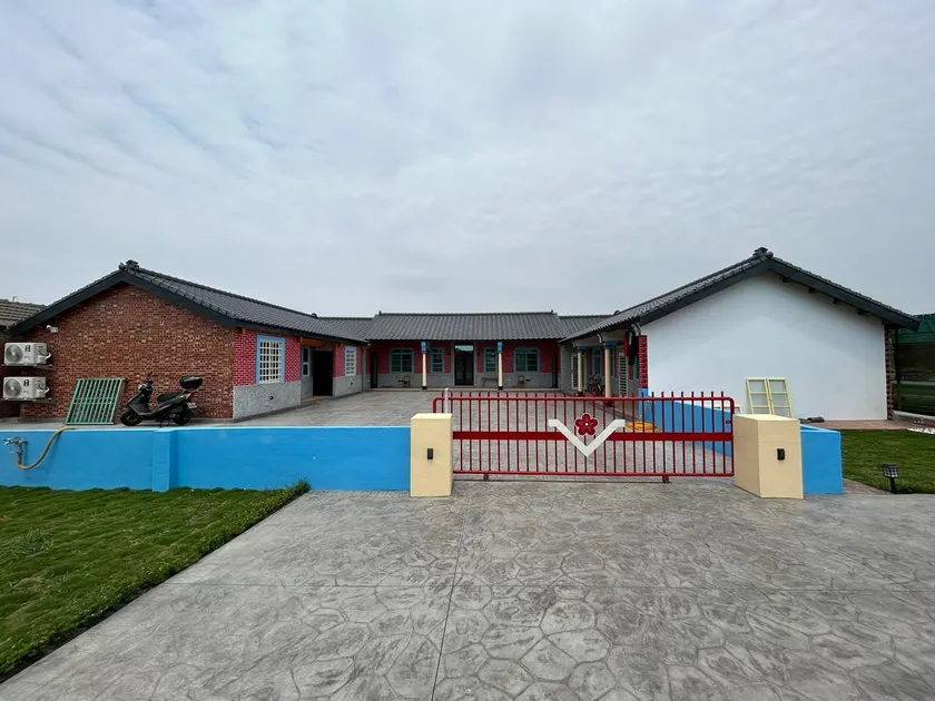Jiugu Courtyard House - Image 1
