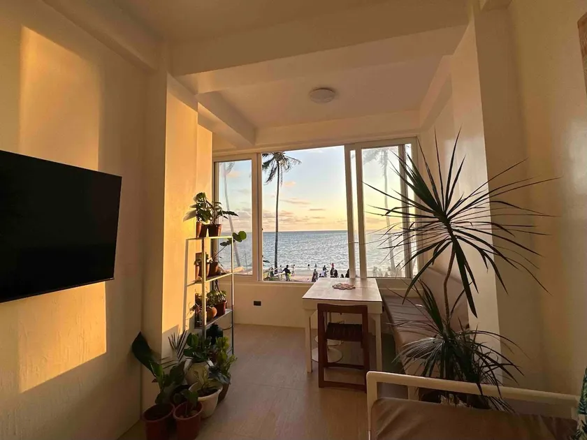 Beachfront Apartment with Kitchen and Outdoor Seating Area - Image 1